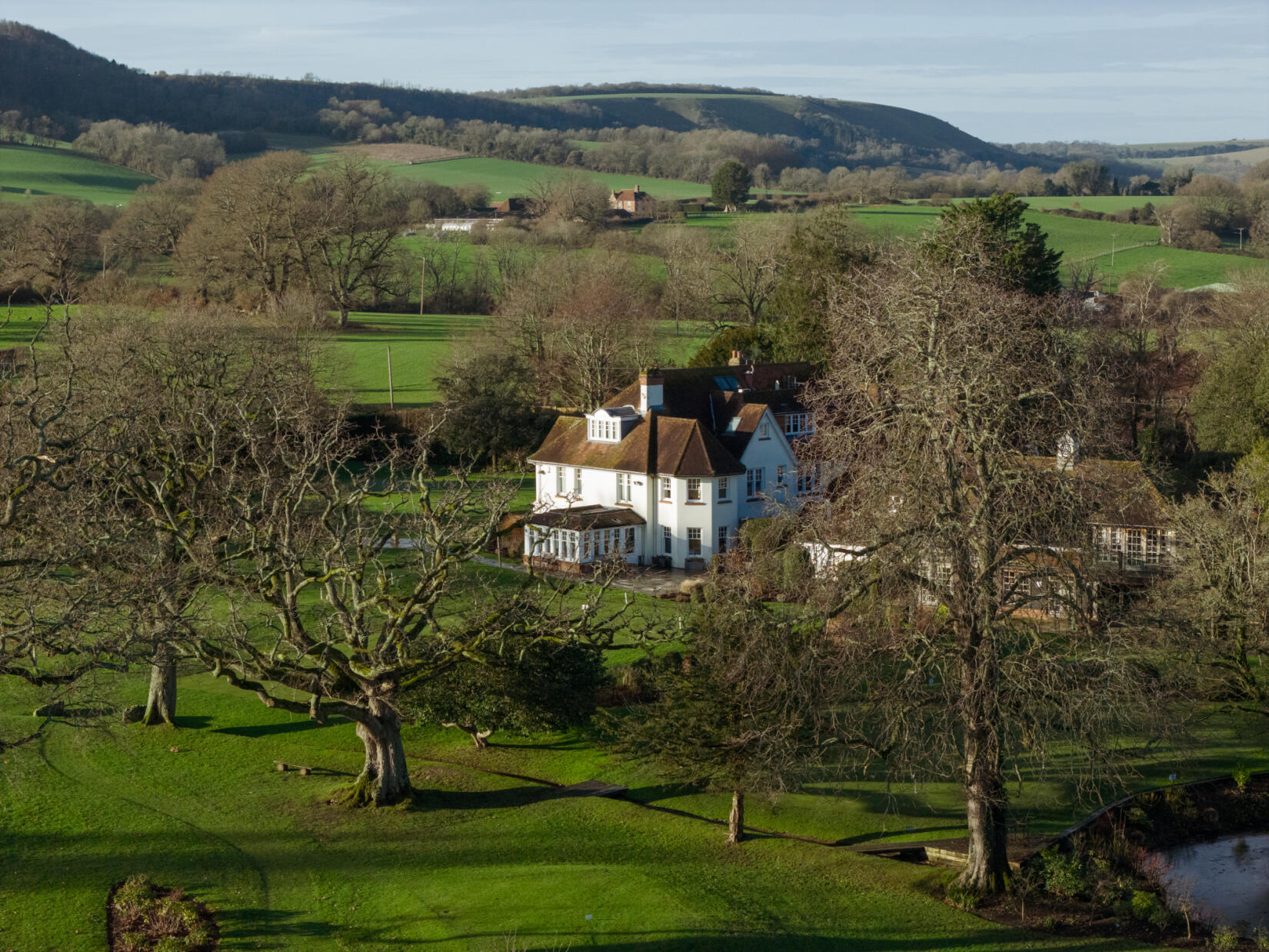 An image of an aerial shot of the hotel in winter