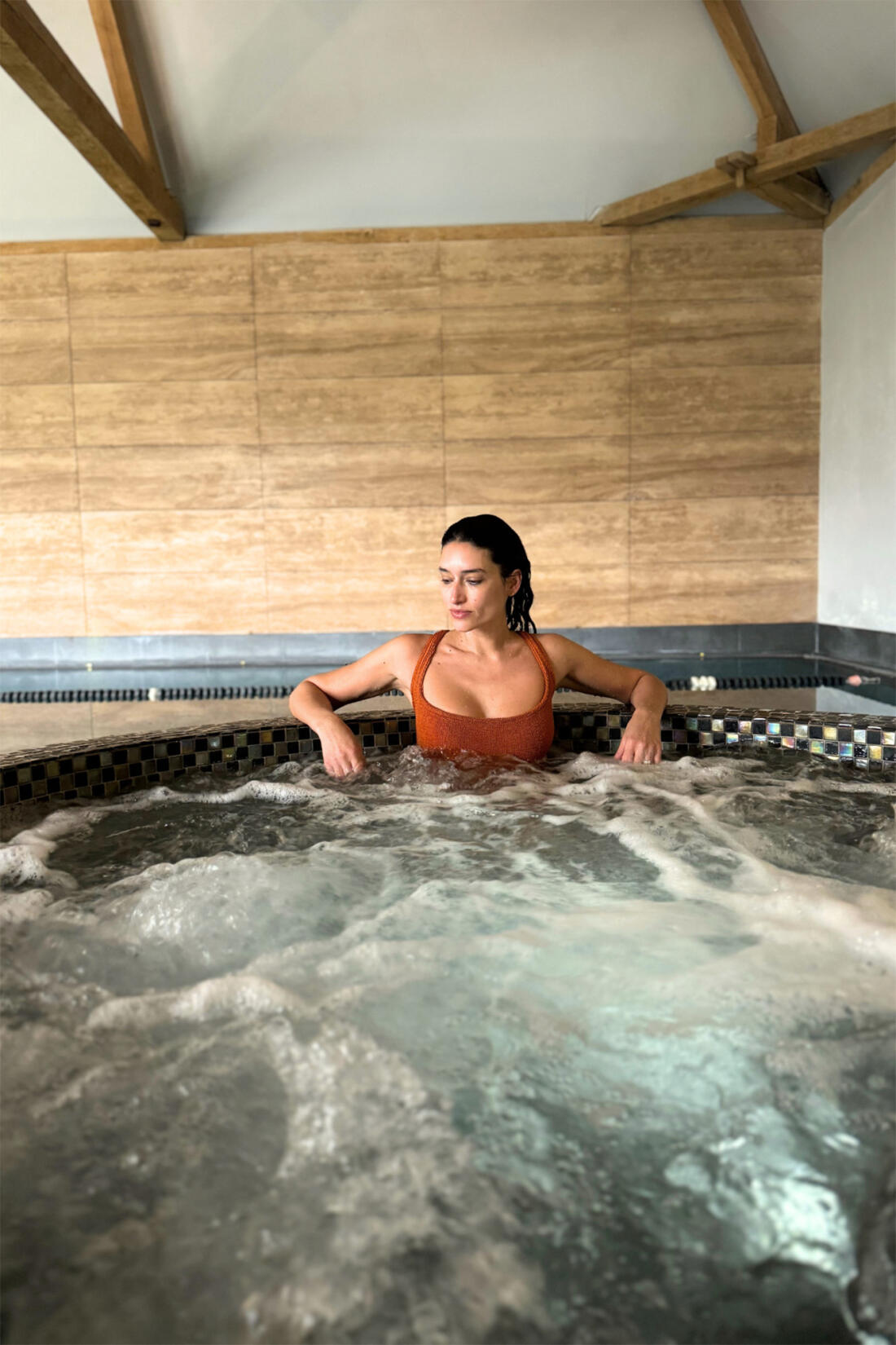 An image of a woman in the jacuzzi