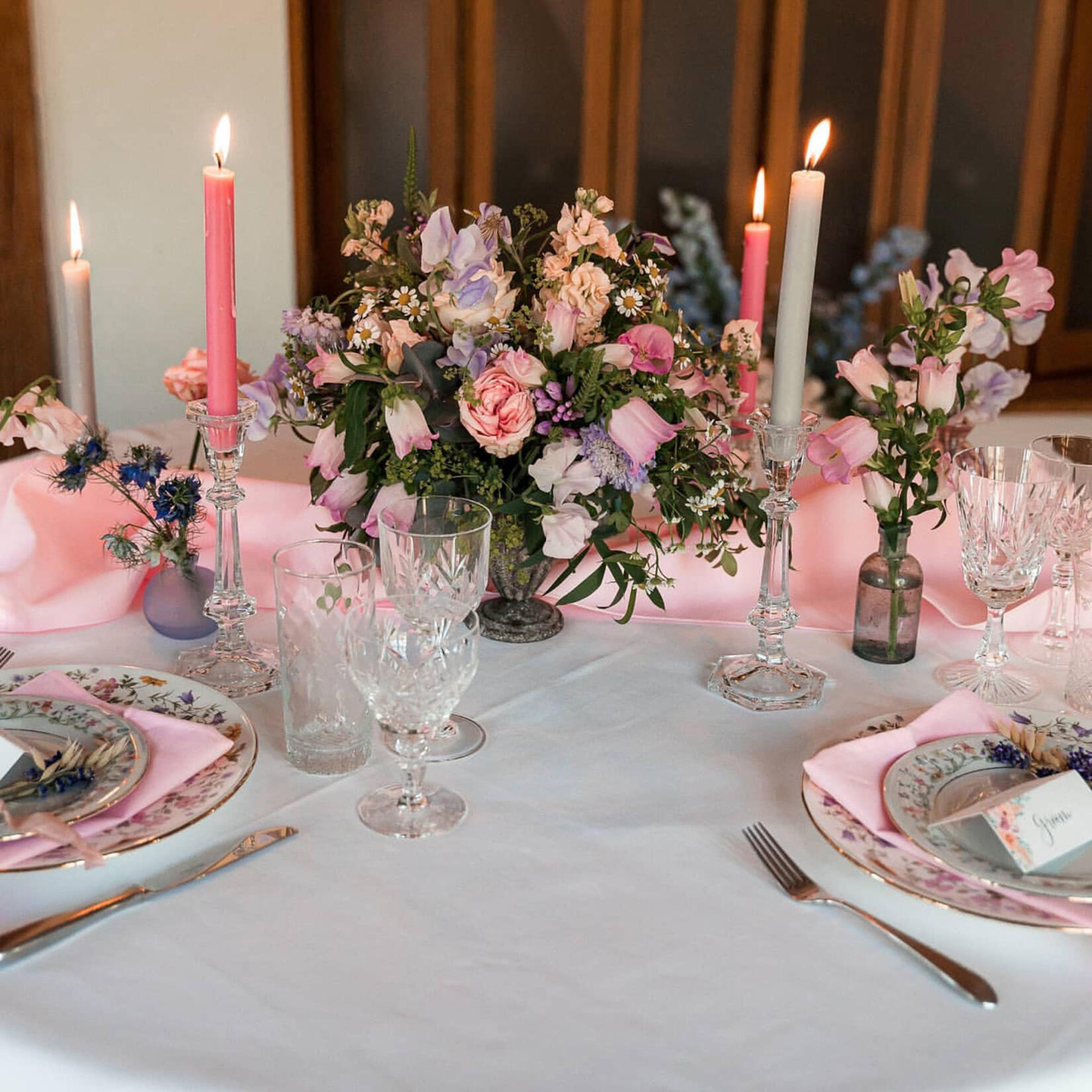 An image of a wedding table setup with flowers