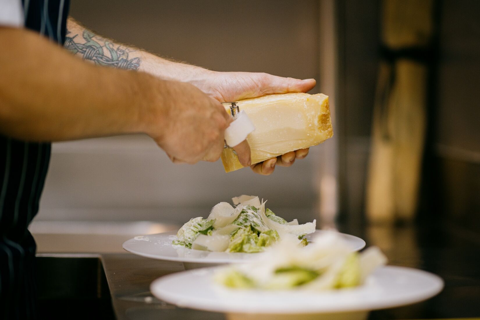 Chef grating cheese